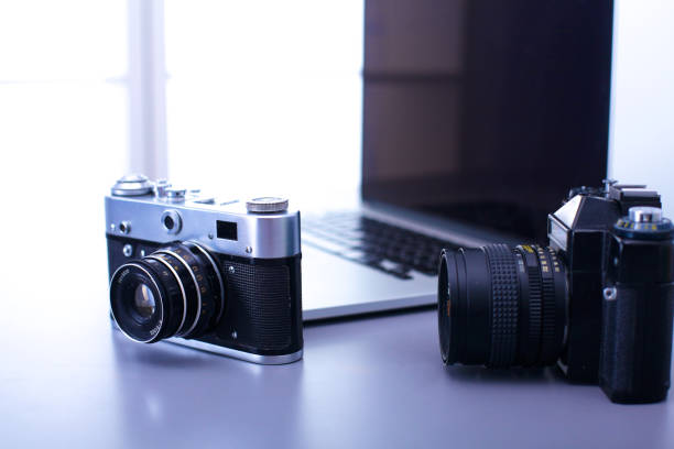 istock digital camera and colour swatches on an office desk 885231964