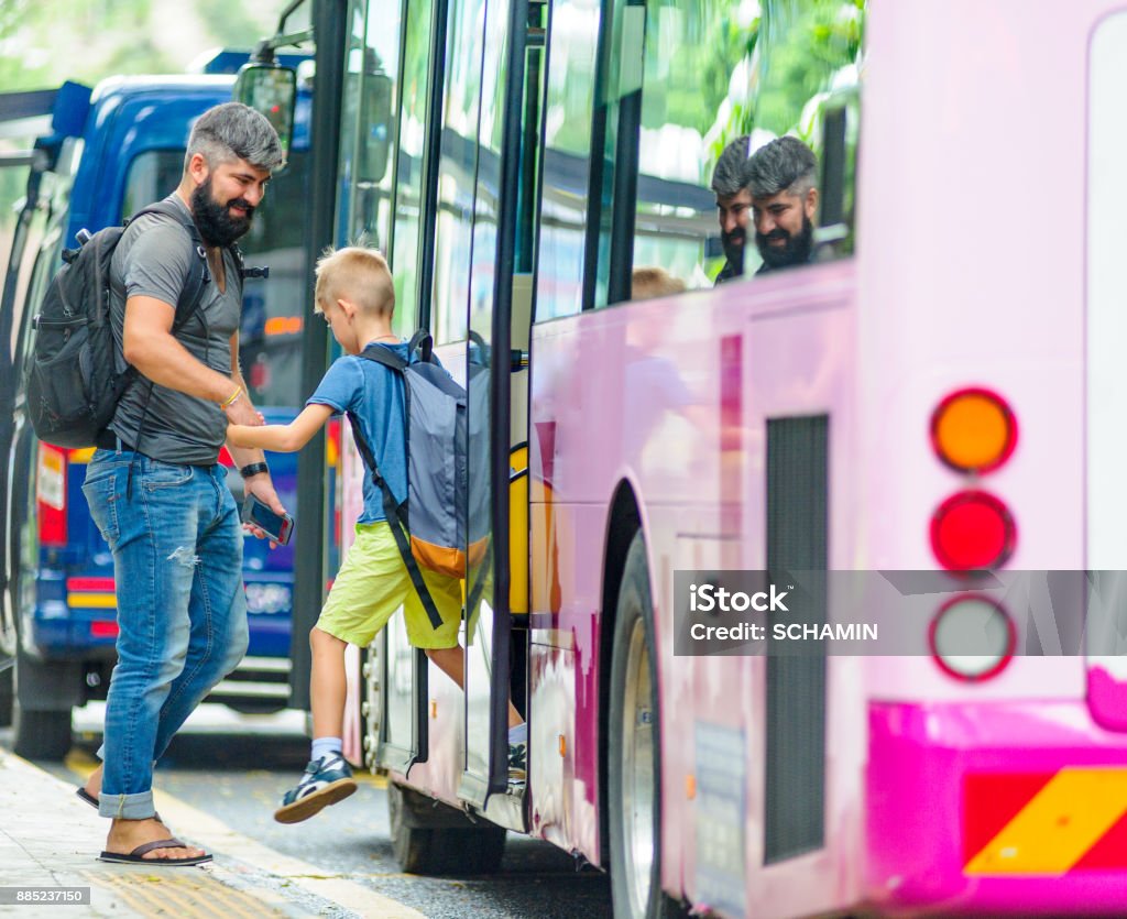 Father and son happy and excited together for the trip to Kuala Father and son happy and excited together for the trip to Kuala Lumpur. Making a city tour. Holiday vacation, traveling abroad concept, copy space 30-39 Years Stock Photo