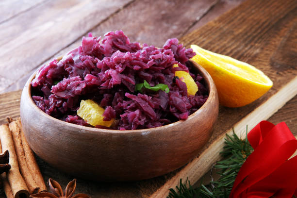 istock Red Cabbage salad with orange and pecan nuts for Christmas dinner. Vegetarian dish. 885240458