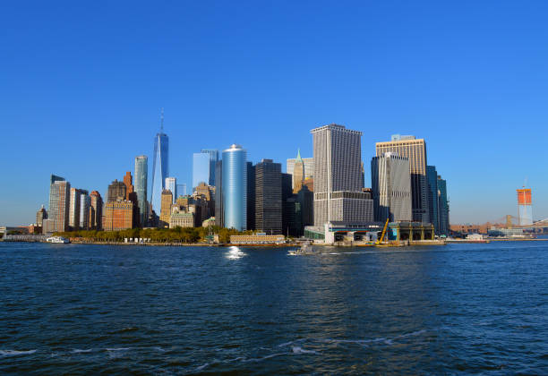 Lower Manhattan New York City Looking north towards l;ower Manahattan from upper bay to the struggle against world terrorism statue photos stock pictures, royalty-free photos & images