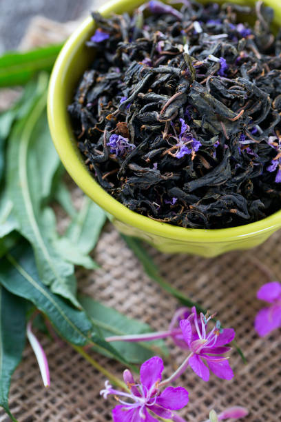 istock fireweed tea in a bowl on wooden surface 885281338