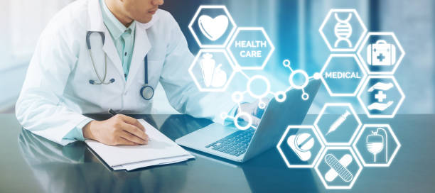 istock Medical concept - Doctor on Computer with Icons 885314642