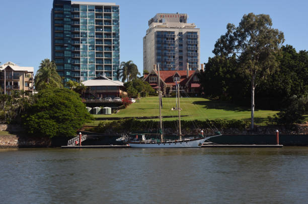A sailing yacht is moored on the edge of the rolling lawns in front of Shafston House which was built in stages between the 1850s and the 1920s. Until 1919 it was used as a residence by various prominent people as well as serving as a town house for country graziers. After World War I the Commonwealth government converted it to a hostel for injured servicemen and in 1995 it became part of Shafston International College.