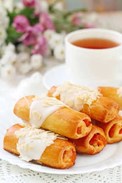istock Roll with sweet cream, almonds and apricot jam 885321284