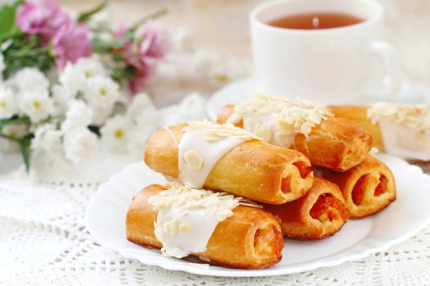istock Roll with sweet cream, almonds and apricot jam 885321298