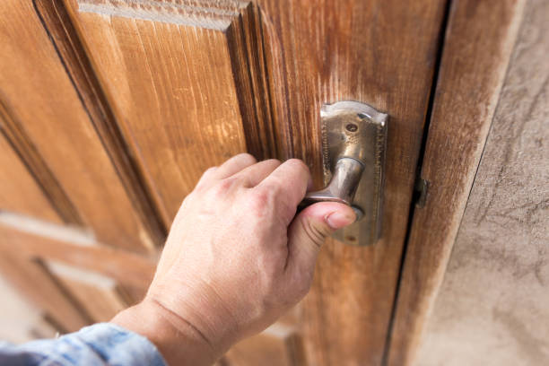 istock opening the doors of the old hand 885339208