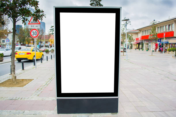 istock vertical blank billboard on the city street 885347612