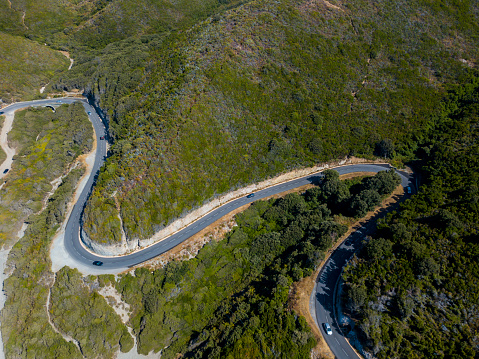 Aerial view of winding roads of the French coast. Cap Corse Peninsula, Corsica. Coastline. France