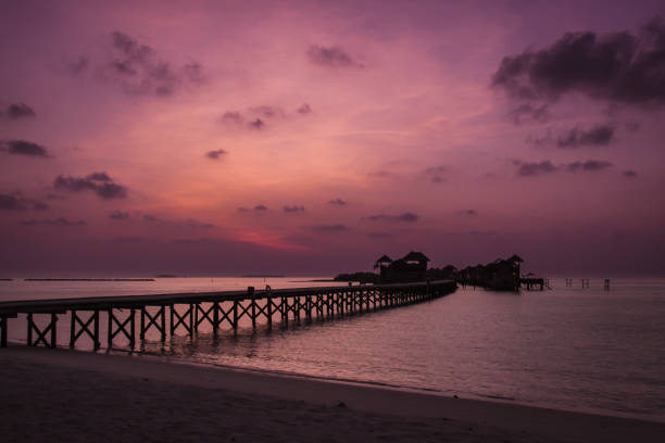 istock Maldives island in Sunset 885358604