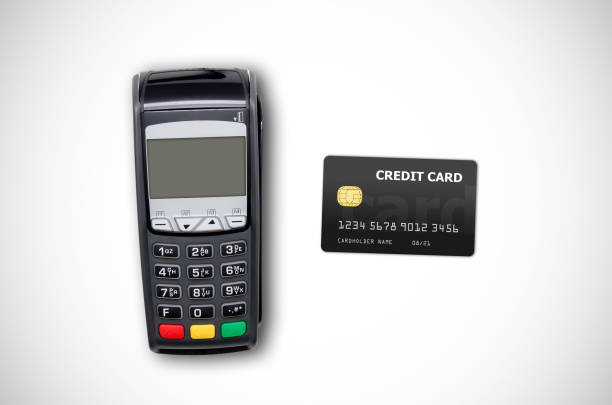 istock Payment terminal and credit card on white background 885368008