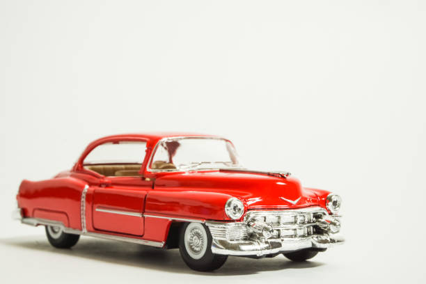 istock Red miniature classic car. white background 885368680
