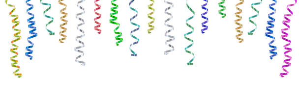 istock Panoramic festive image with close-up multi coloured rolls curly ribons hanging from the top on black backgroung 885374826