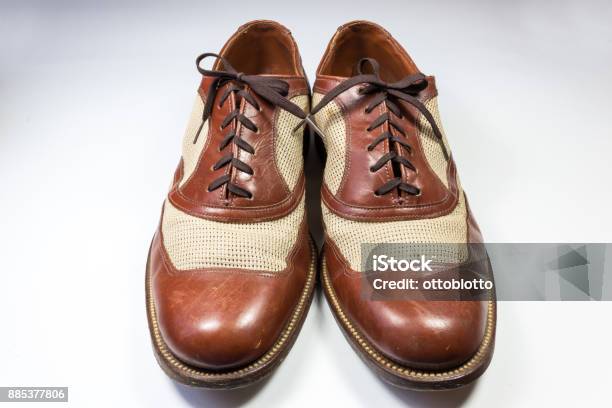 Front View Of A Pair Of Mens Vintage Leather And Webbing Shoes On White  Stock Photo - Download Image Now - iStock