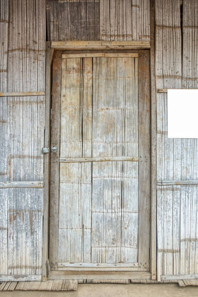 istock Bark bamboo weave door house 885388730