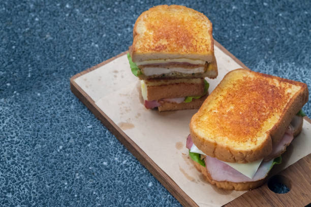 istock Close up chicken cordon bleu sandwich. (selective focus) 885393990