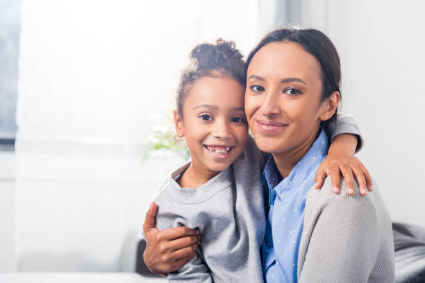 istock embracing mother and daughter 885396926