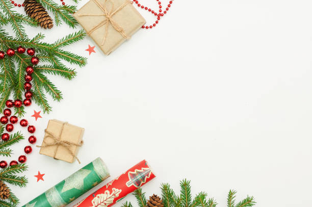 istock Christmas gifts and fur-tree branch 885397128