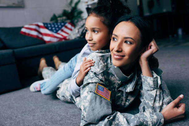 istock african american daughter and mother 885409178
