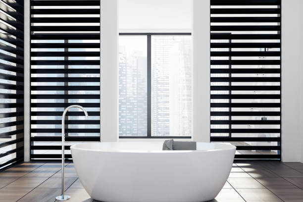 istock Luxury white and black bathroom, tub 885426058