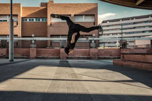 istock Man practicing parkour in the city 885426418