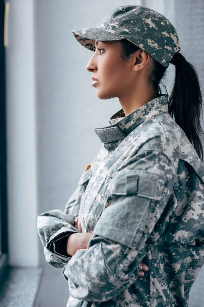 istock soldier in military uniform 885430238