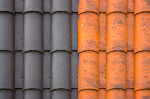 istock Red plastic roof tiles home texture 885432792