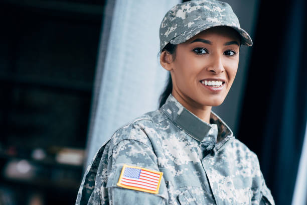 istock soldier with usa flag emblem 885433084