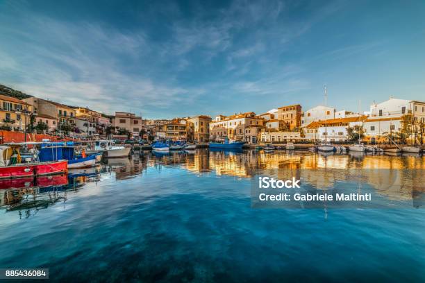 Reflections In La Maddalena Harbor At Sunset Stock Photo - Download Image Now - Sardinia, La Maddalena - Sardinia, Italy