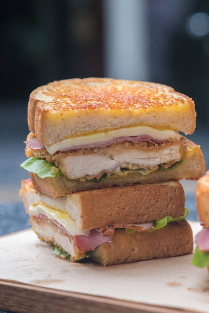 istock Close up chicken cordon bleu sandwich. (selective focus) 885436262