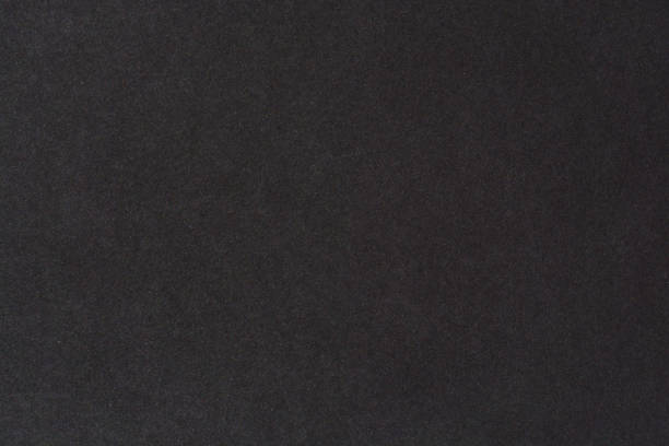 tło tekstury czarnego papieru. czarna, bawełniana strona papieru - paper grain zdjęcia i obrazy z banku zdjęć