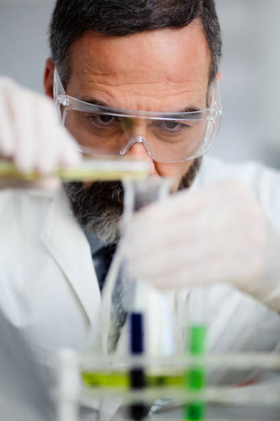 istock Senior male scientiest in laboratory 885440954