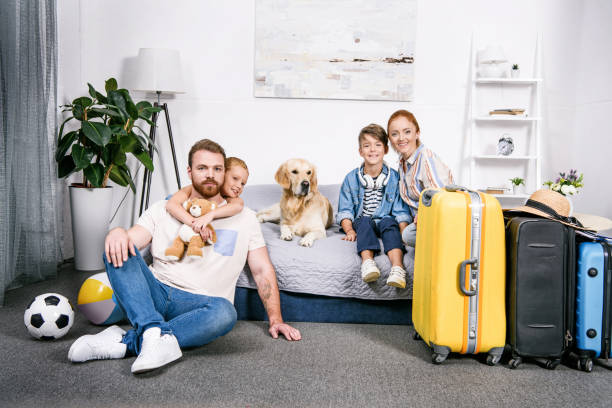 istock family with dog ready for trip 885441000