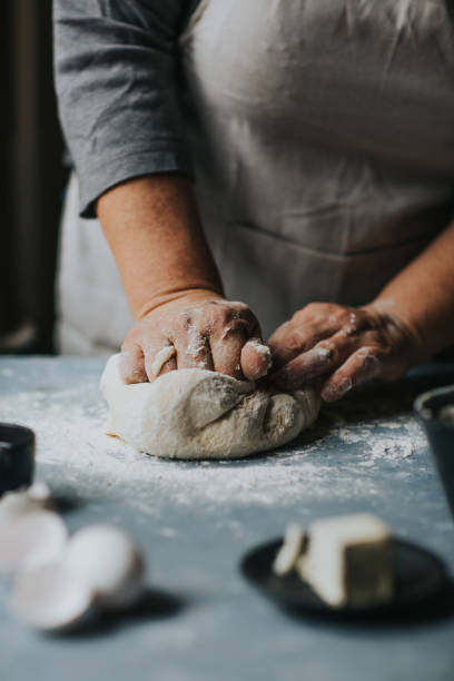 Cooking Woman working with dough 3686 stock pictures, royalty-free photos & images