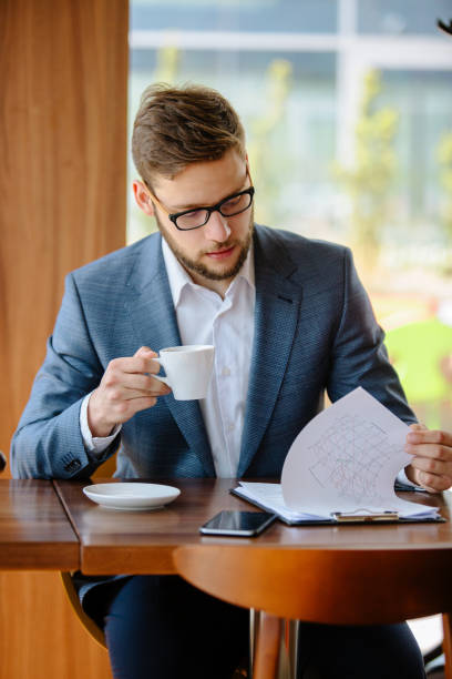 istock Businessman at coffee break 885460402