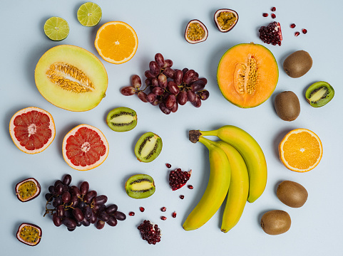 Fruit flat lay from above colorful food background