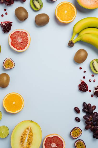 istock Fruit flat lay from above colorful food background 885478290