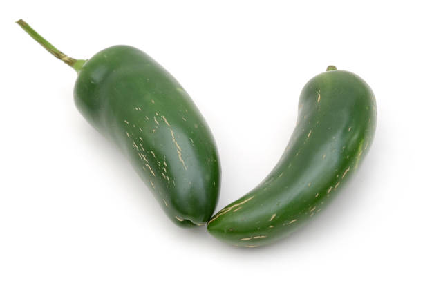 istock Green jalapeno pepper isolated over the white background 885481334