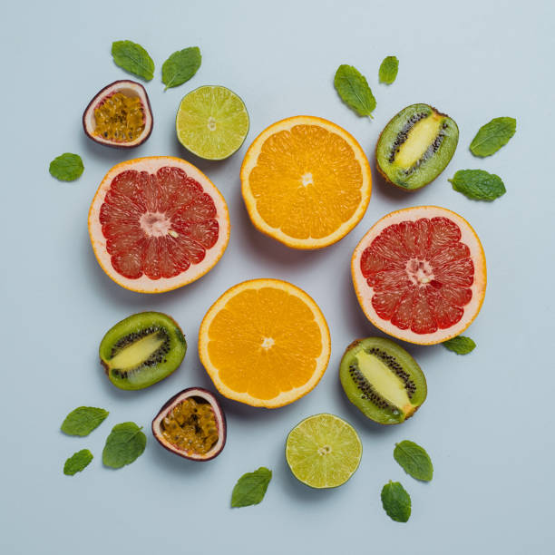 Citrus fruit flat lay from above colorful food background