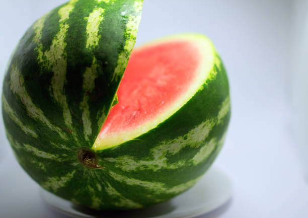 istock close up of watermelon on white background. 885522748