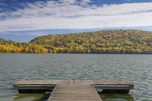 Landscape with Trees in Autumn Colors (Foliage), Pier and Blue Sky at Rockland Lake State Park, Hudson Valley, New York. Canon EOS 6D (full frame sensor). Polarizing filter.