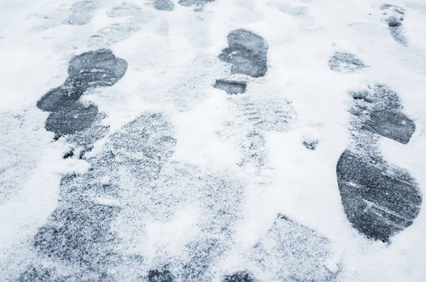 istock Footprints in ice-crushed ground, winter 885537658
