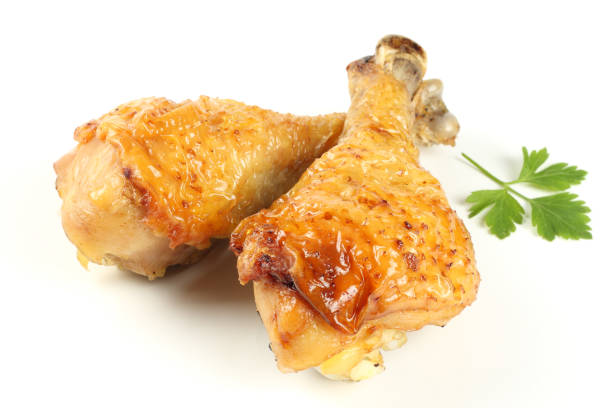 istock Grilled chicken leg isolated on white background 885548720
