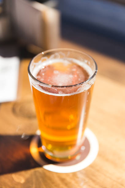 istock Fresh Pint of Beer in Sunlight 885559374