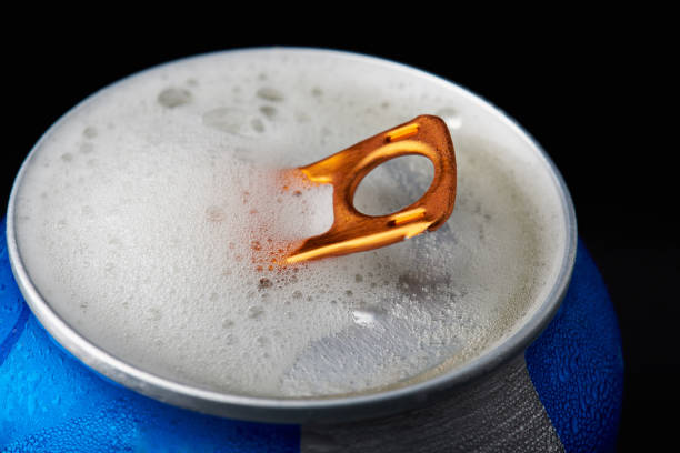 istock Beer foam in open metal can 885566510