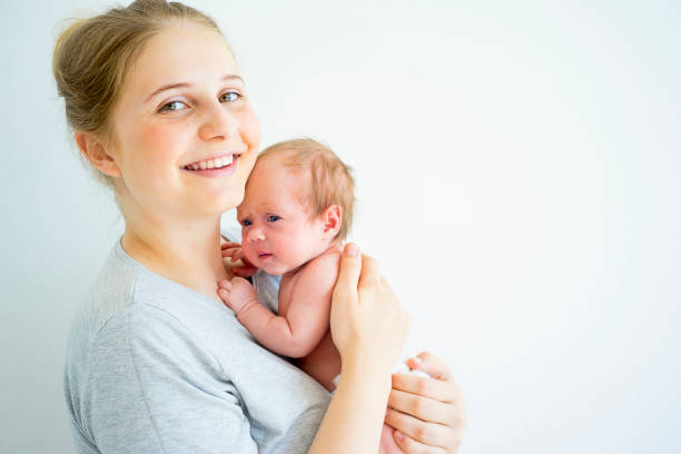 istock Mother with her baby 885574006