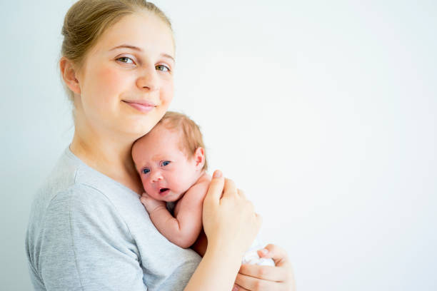 istock Mother with her baby 885574142