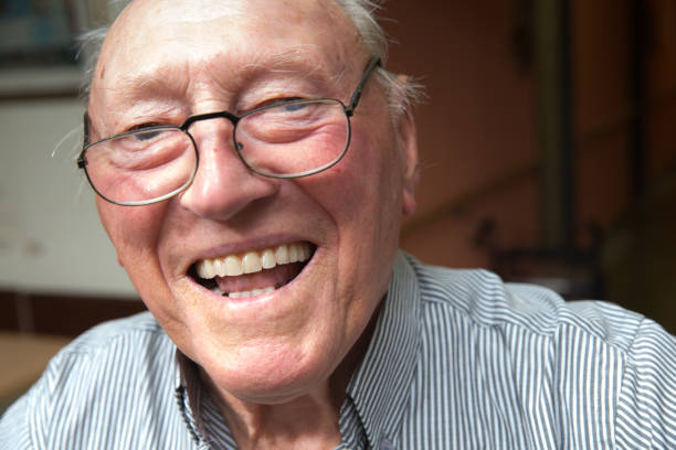 istock Portrait Of Cheerful Senior Man 885574452