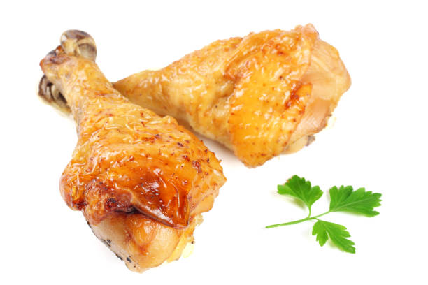 istock Grilled chicken leg isolated on white background 885574846