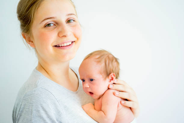 istock Mother with her baby 885575010