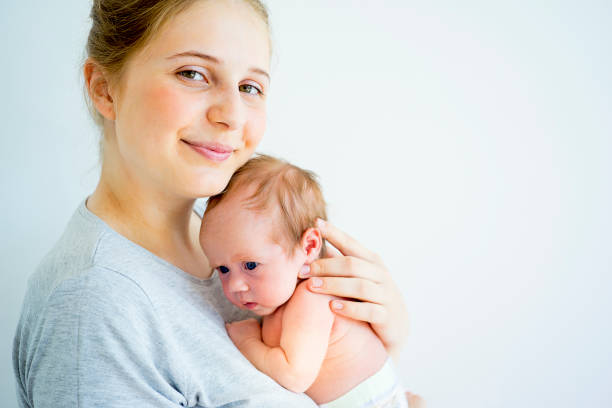 istock Mother with her baby 885575072